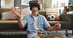 Relax, gaming and man with vr headset, home and simulation of virtual reality for gamer in living room. Online, player and person with eyewear for entertainment, user experience and futuristic tech