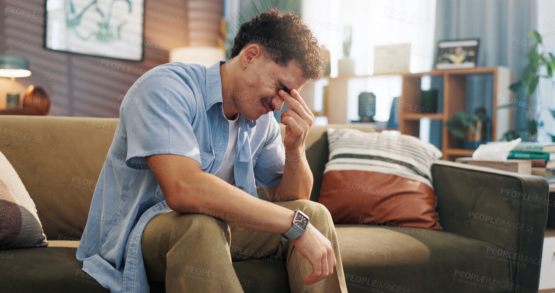 Buy stock photo Frustrated man, stress and sofa with headache for anxiety, mental health or vertigo at home. Male person, strain or pain with migraine or sore head for pressure, fatigue or burnout on couch at house