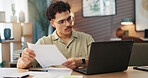Man, finance and documents with laptop in home for budget planning, expenses or bills. Male person, accountant or remote worker with paperwork on computer for mortgage payments, invoices or statement