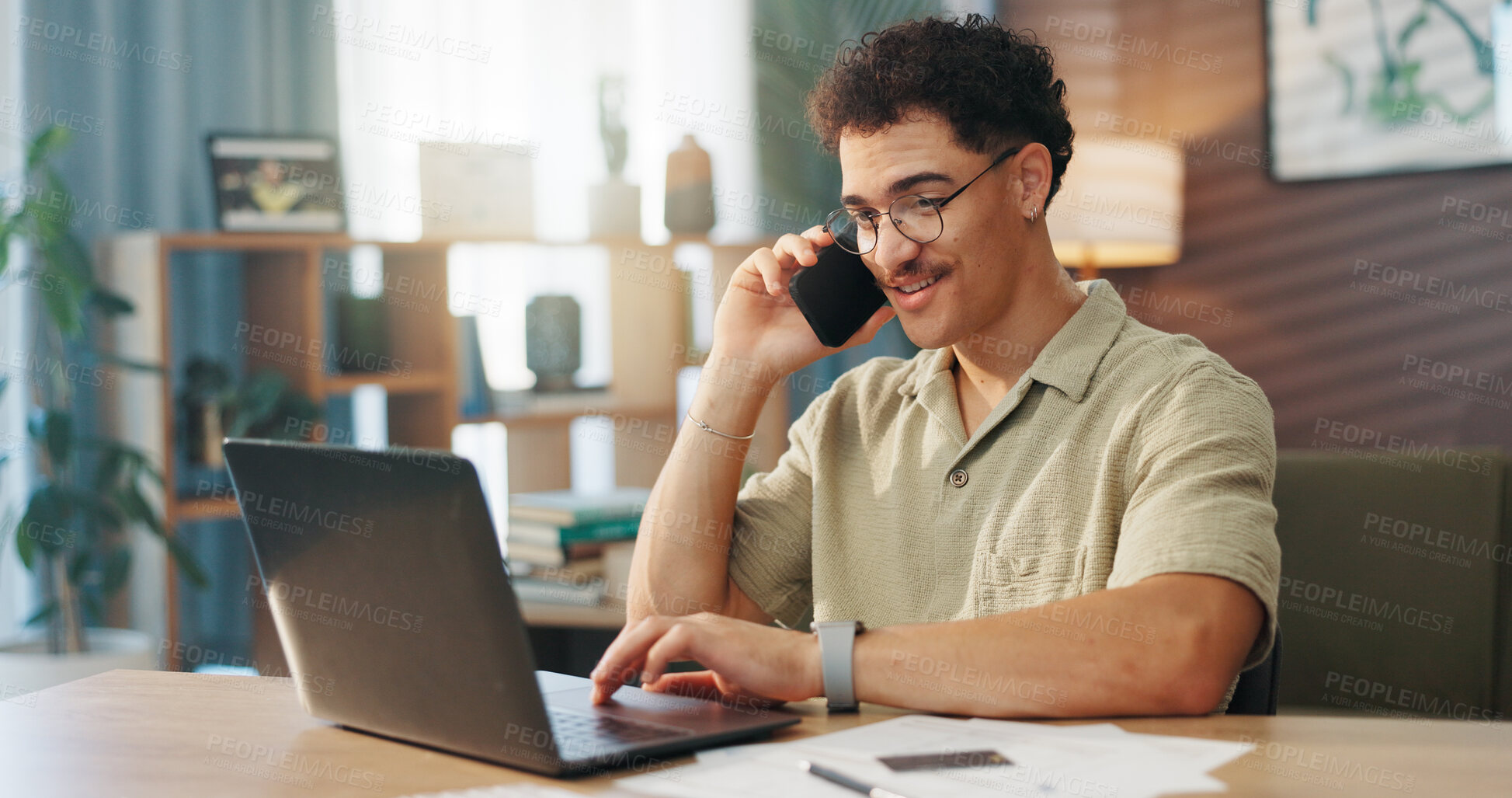 Buy stock photo Business, laptop and phone call with man in home office for startup planning or research. Computer, conversation and remote work with freelance employee at desk in apartment for mobile feedback