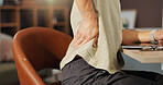 Back pain, injury and person at desk with posture problem, burnout or fibromyalgia with remote working. Freelancer, accident or emergency with spine inflammation, tension or pressure of ache in home