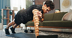 Fitness, laptop and man in home for workout, exercise and training for muscle strength with website. Sports, living room and person with computer for online tutorial, video and streaming for wellness
