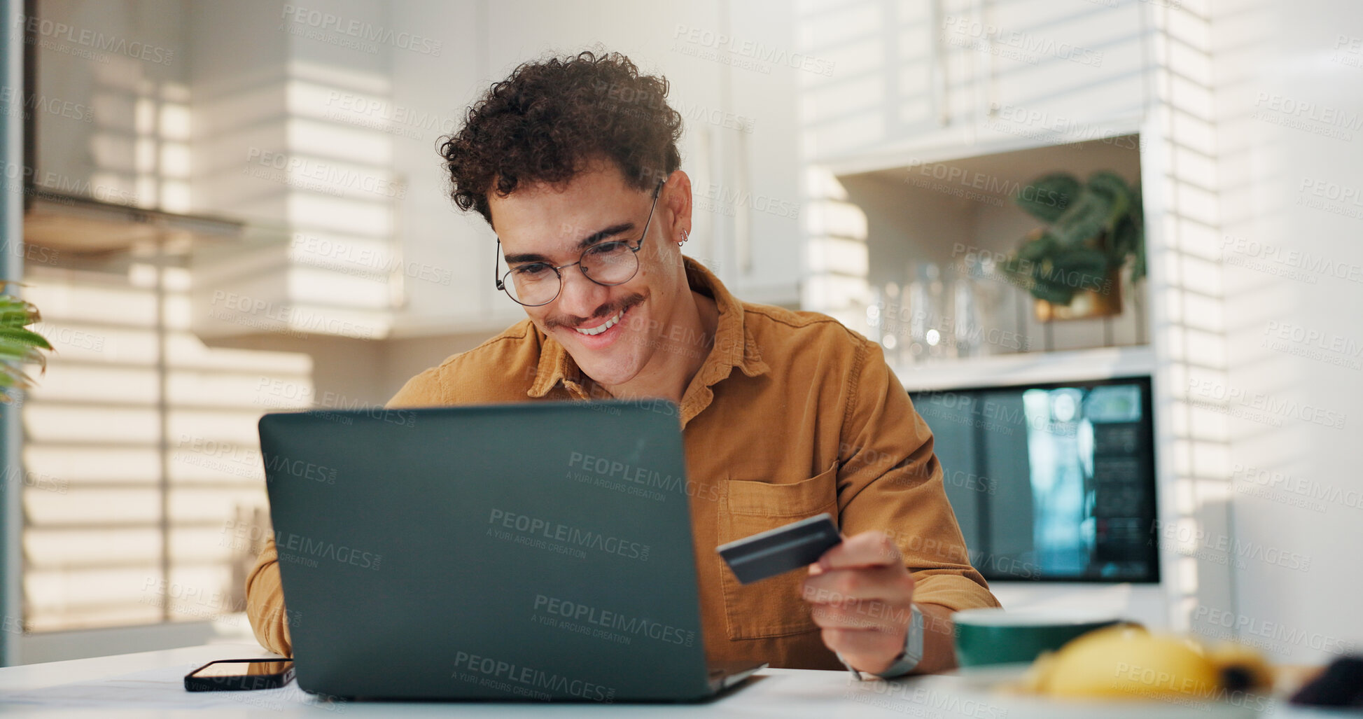 Buy stock photo Man, credit card and happy with laptop in home for online shopping, cart checkout and rewards voucher code. Fintech, person or internet portal for bills payment, banking or debit pin for subscription
