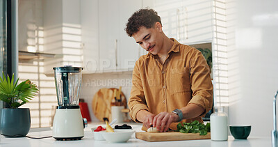 Buy stock photo Man, smoothie and cut vegetables in kitchen for breakfast shake, meal replacement and diet nutrition. Blender, person and ingredients preparation in home for healthy recipe, fresh fruit and wellness