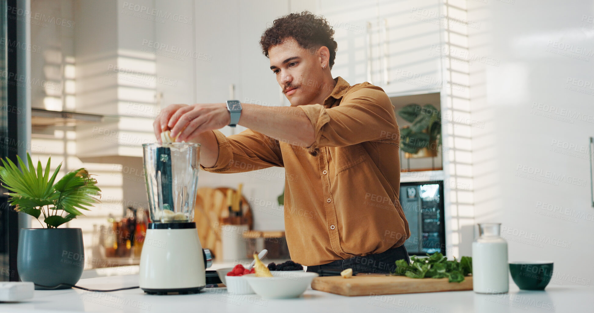 Buy stock photo Smoothie, blender and man with fruit in kitchen for breakfast shake, meal replacement and healthy nutrition. Drink, person and preparation in home for weight loss beverage, protein diet and wellness