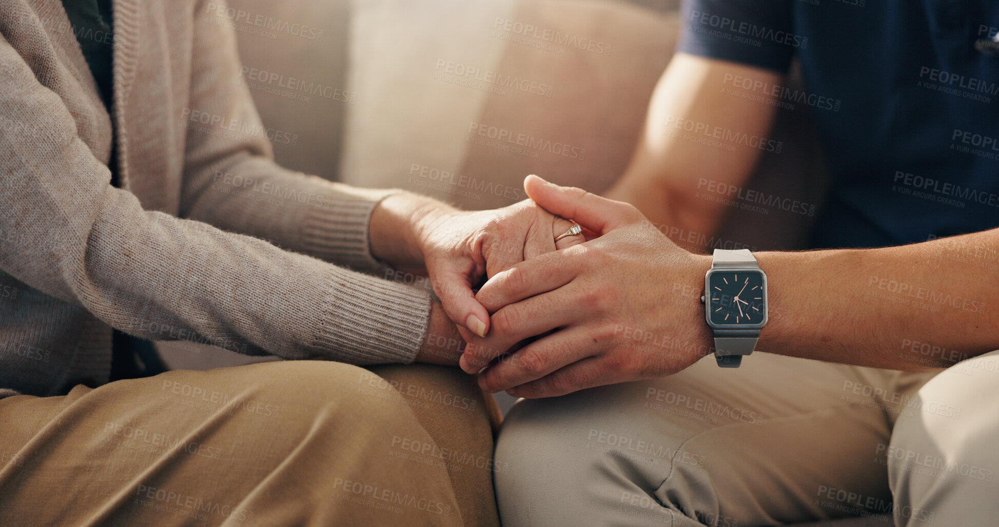Buy stock photo Senior, person and holding hands with caregiver on sofa for empathy, retirement support and compassion. Closeup, patient and health worker in assisted living with comfort and console for medical news