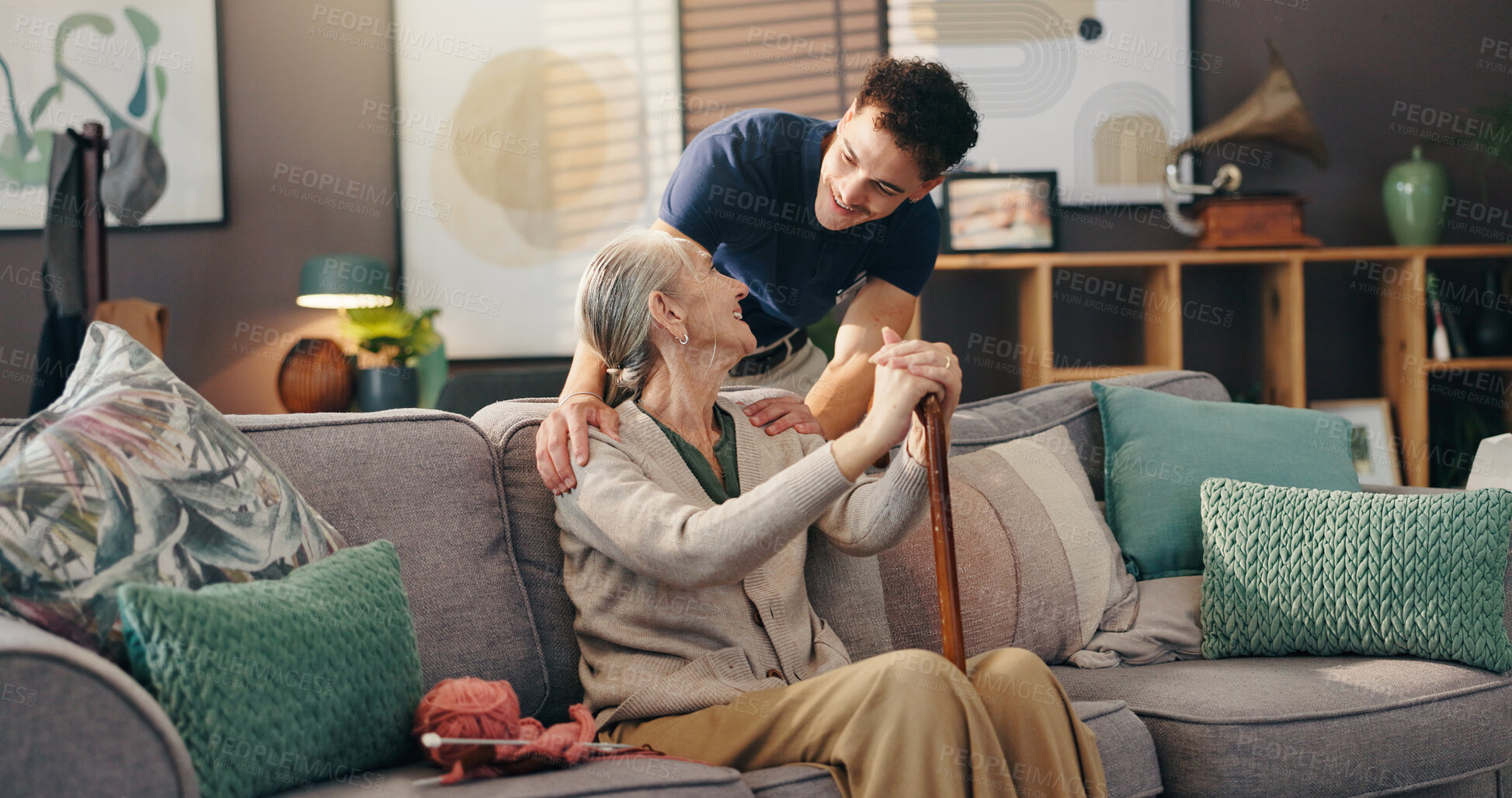 Buy stock photo Senior woman, nurse and sofa with assisted living for healthcare service at old age home. Caregiver, medical worker or physiotherapist helping elderly or person with a disability at retirement house