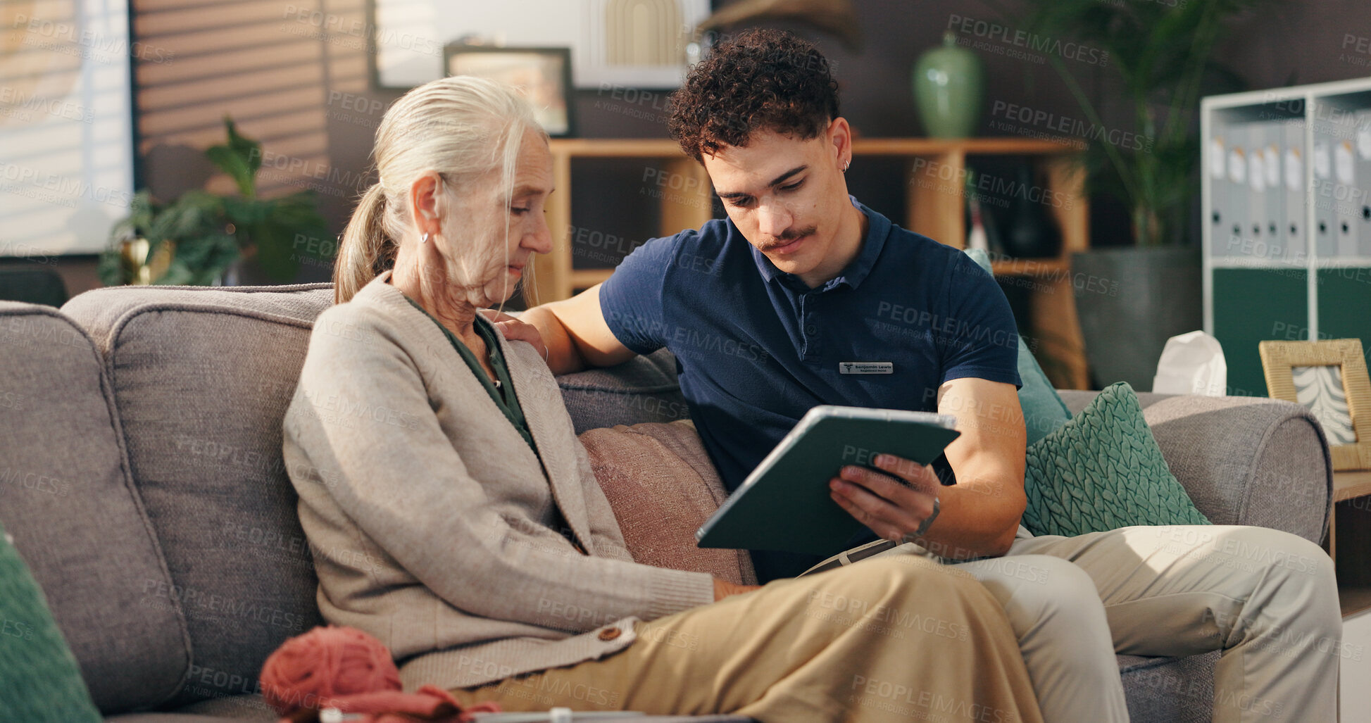 Buy stock photo Old woman, nurse and tablet on couch, sad and report with diagnosis in living room in home. Caregiver, elderly person and digital touchscreen for health, app and results with bad news in retirement