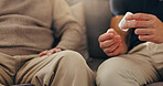 Hands, patient and caregiver with pills on sofa for illness management, prescription drugs and explain dosage. Medicine, person and healthcare worker with medication discussion for health treatment