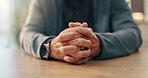 Hands, prayer and senior person with faith in house, religion and connection with holy spirit in retirement. Belief, worship and Christianity with praise, God and peace in morning at nursing home