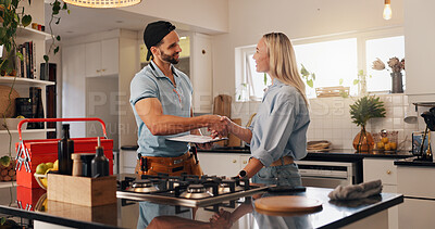 Buy stock photo Woman, man and plumber with handshake in kitchen for thanks, report or deal for repair at house. People, handyman and client with shaking hands for service with smile, inspection or leak at apartment
