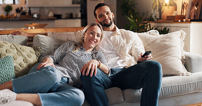 Buy stock photo Couple, relax and watching tv on sofa, smile and home with streaming, film or love with bonding in lounge. People, woman and man with remote control on couch for movies, happy and show in living room