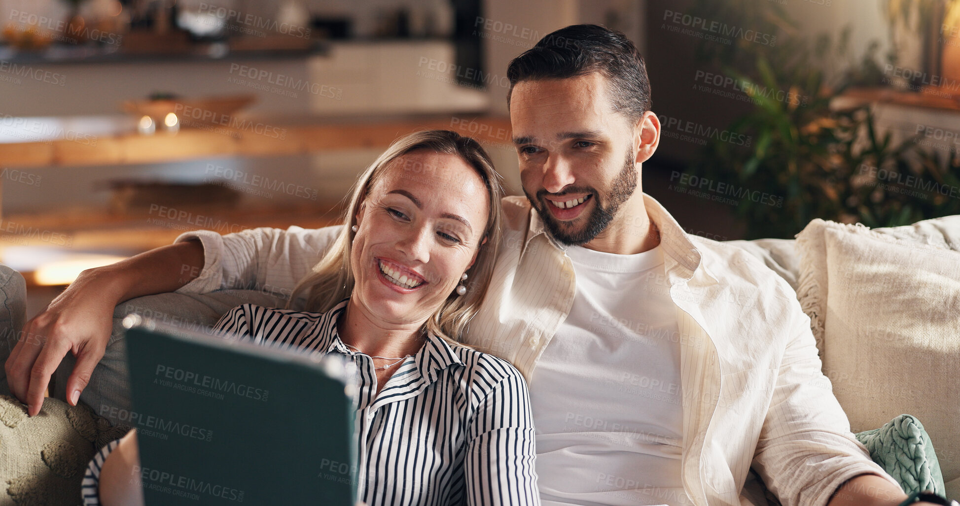 Buy stock photo Woman, man and tablet with smile on sofa, relax and streaming with film, show or comedy in home. Couple, happy and digital touchscreen with application for social media, movies or series at apartment