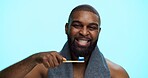 Black man, smile and portrait with toothbrush for brushing teeth, dental health or bamboo in studio. Toothpaste, oral care and whitening with sustainable tool for mouth hygiene on blue background