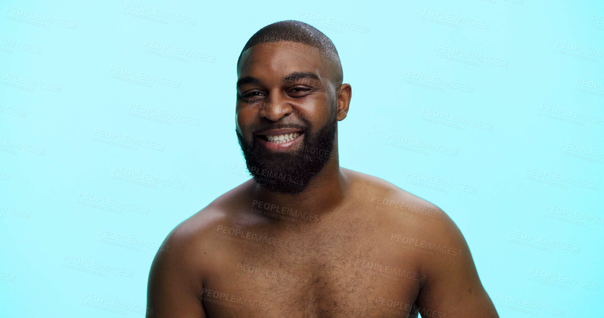 Buy stock photo Black man, portrait and smile in studio for skincare, confidence and grooming in morning. African person, dermatology and happy on blue background space for beard care, topless and hygiene in Nigeria