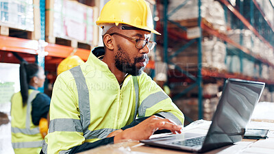 Buy stock photo Man, laptop and report for logistics at warehouse with review for order, schedule or inventory management. Person, computer and scroll for shipping, distribution or supply chain at industrial plant