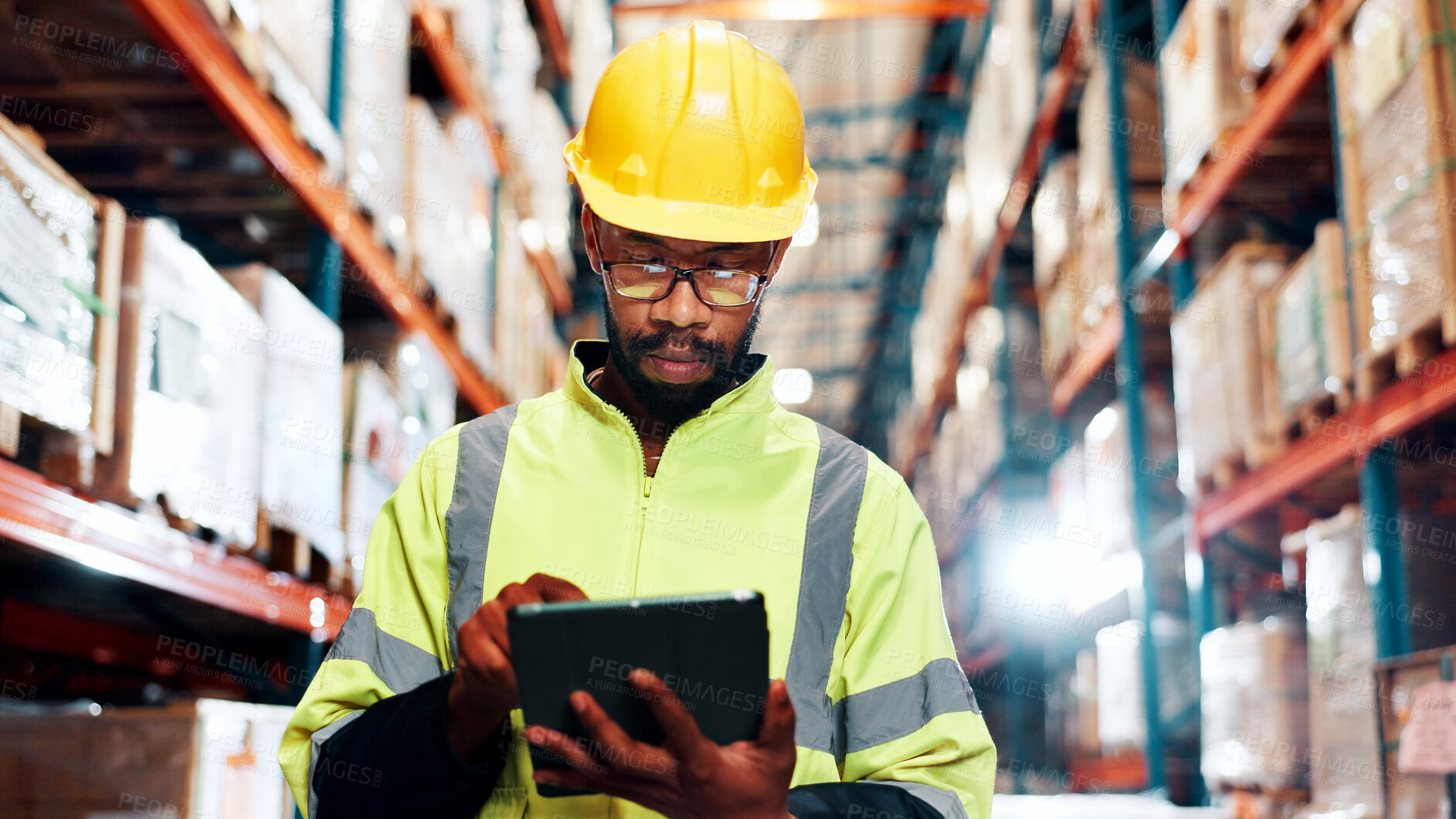 Buy stock photo Black man, tablet and typing for distribution at warehouse with review for order, contact and inventory management. Person, touchscreen and app for shipping, logistics and supply chain at plant