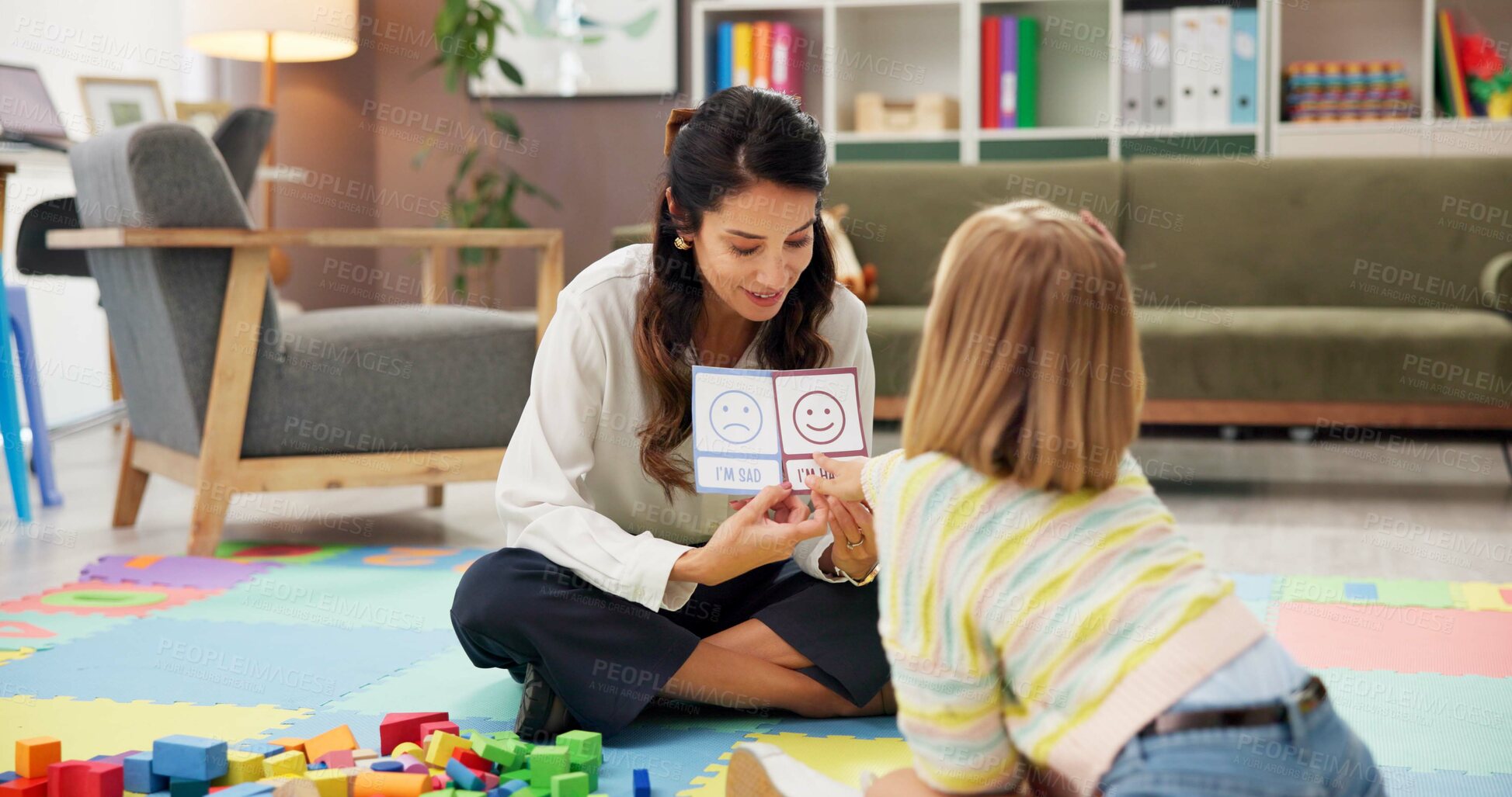 Buy stock photo Woman, therapist and child with visual lesson for private tutoring or assessment at therapy office. Female person, psychologist or academic practice with pictures for education or learning difficulty