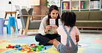 Woman, girl and card with therapy for emotion, choice and happy emoji for mental health assessment on floor. Paper, therapist and child with decision for feelings, sign and evaluation at clinic
