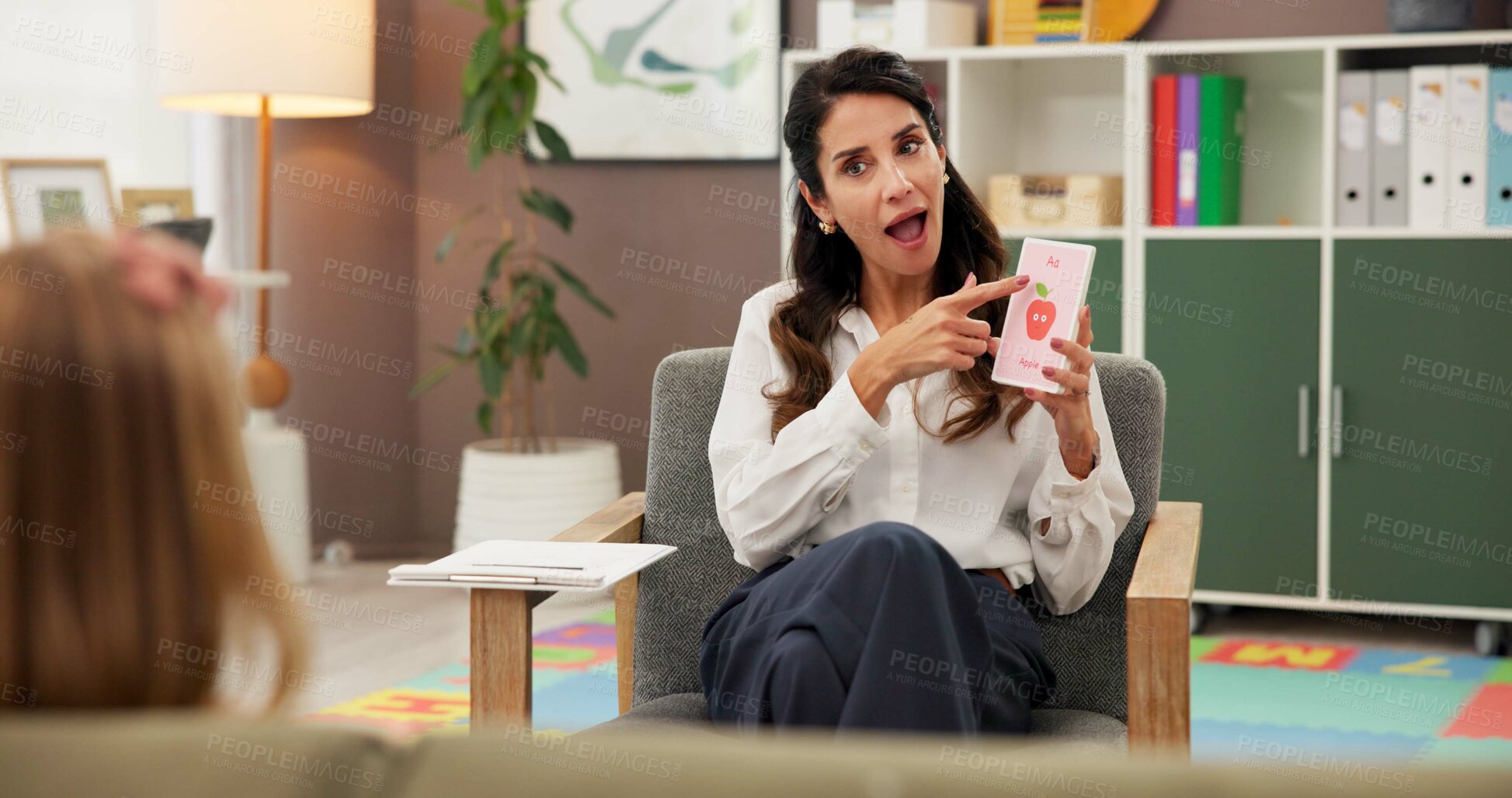 Buy stock photo Education, card or language with student and therapist in office for development or learning. Pointing, sounds or speech therapy with woman and child at practice for assistance, growth or phonics