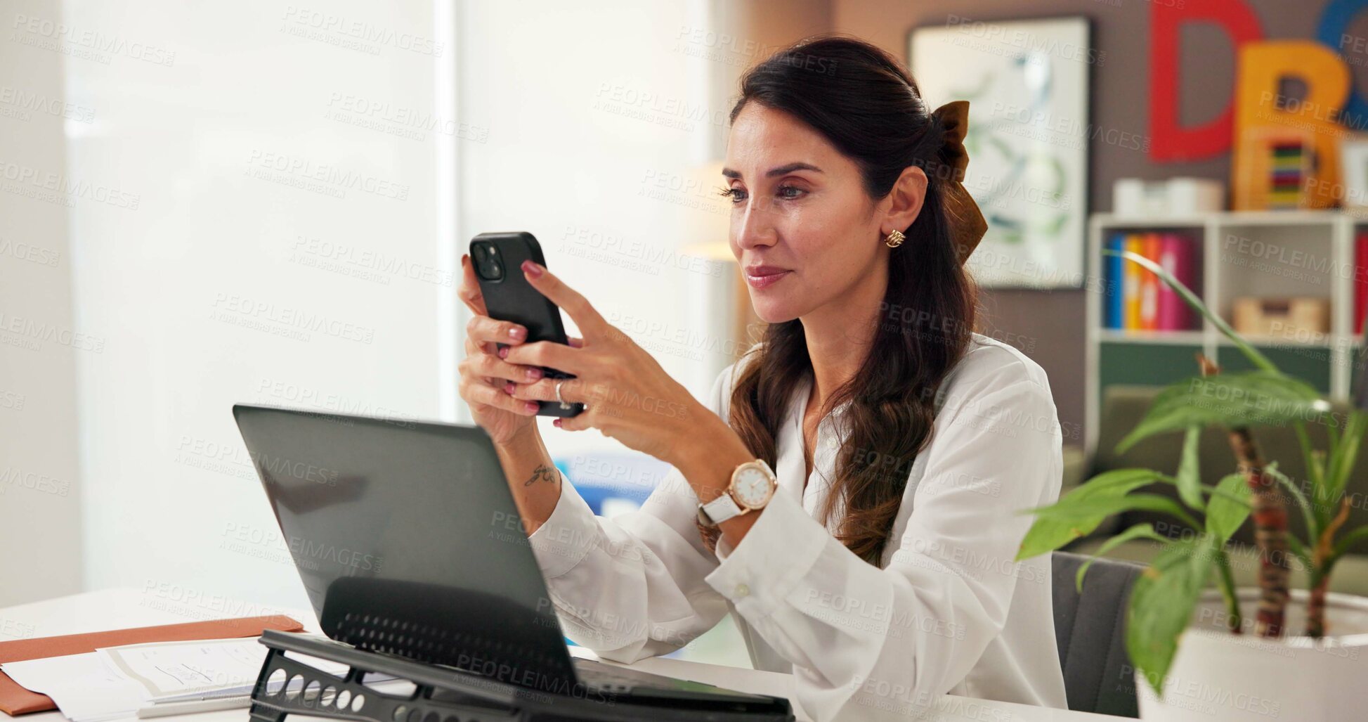 Buy stock photo Phone, laptop and psychology with woman in office for consulting, child development and schedule. Education therapist, advice and learning evaluation with person in clinic for contact and search