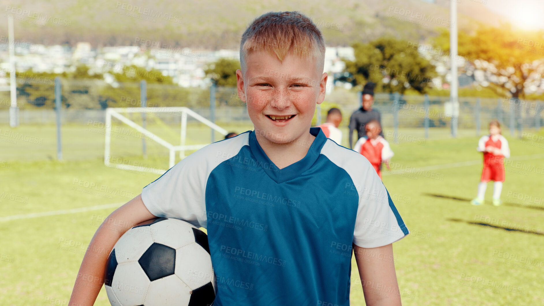 Buy stock photo Portrait, soccer ball and boy with fitness, kid and smile with confidence, pride and training. Face, player and outdoor with child development, game and practice with sportswear, team and learning