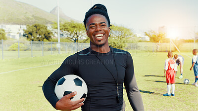 Buy stock photo Portrait, coach and man with ball, soccer and confident for training routine, happy and outdoor. Sports field, trainer and person with smile in morning, proud and fitness for football or laughing