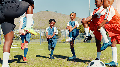 Buy stock photo Group, children and stretching for soccer practice for fitness training, balance exercise and sports workout. Kids, warm up and prepare for game, learning skills and team challenge for match activity