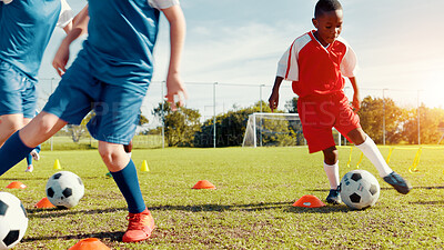Buy stock photo Outdoor, soccer player and children with ball, kick and athlete with energy for practice in morning. Sports field, football and kids with sportswear for game, growth and development with fitness