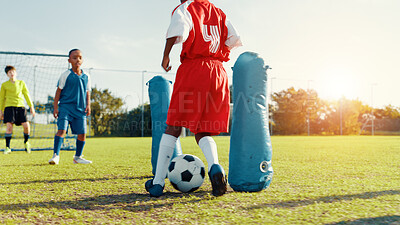 Buy stock photo Fitness, soccer player and children with ball, kick and athlete with energy for practice in morning. Sports field, football and kids with sportswear for game, growth and development with cardio