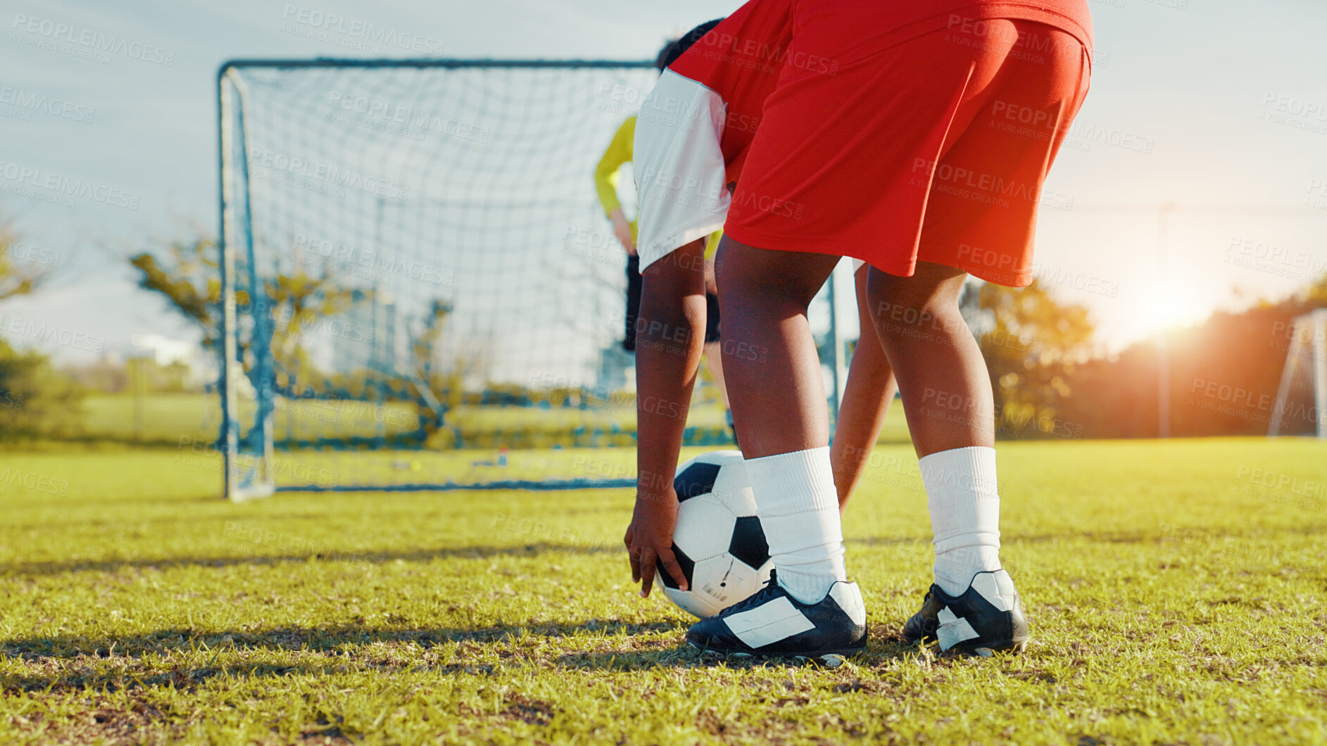 Buy stock photo Playing, soccer and preparing for kick, children and player with skills for game, talent and cardio. Outdoor, football and kids with sportswear for match, growth and development of youth or fitness