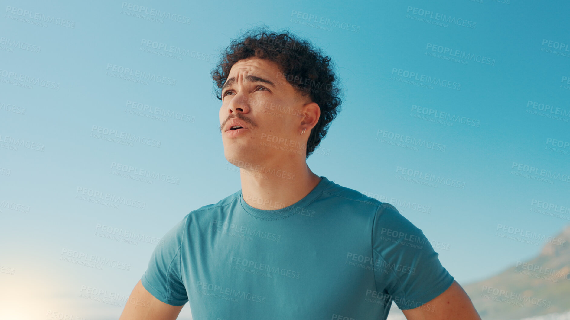 Buy stock photo Man, outdoor and thinking of fitness with fatigue, catching breath and tired at sky space. Runner, exhausted and breathing exercise in nature for wellness, resting and break in cardio training