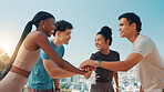 Happy people, fitness and hands together with team in huddle for workout, exercise or motivation. Active, group or friends piling with smile or stack for mission, training or health and wellness