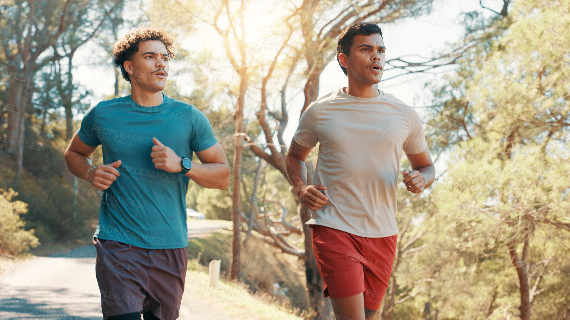 Buy stock photo Men, running and fitness with trees in nature for workout, exercise or training together. Active, male people or runners with path, trail or road on mountain for race, sprint or health and wellness