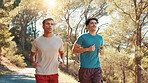 Men, running or fitness with workout in nature for exercise, marathon or training together. Active, male people or runners with path, trail or road on mountain for race, sprint or health and wellness