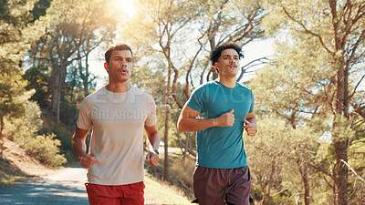 Buy stock photo Men, running or fitness with workout in nature for exercise, marathon or training together. Active, male people or runners with path, trail or road on mountain for race, sprint or health and wellness