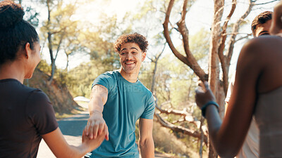 Buy stock photo Running, hands together and team with friends in nature for fitness, workout partners and health. Wellness, exercise club and support with people outdoor for performance, training and challenge