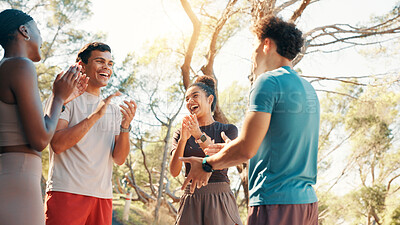 Buy stock photo Runner, laughing and applause with friends in nature for fitness, workout partners and health. Wellness, exercise club and support with people outdoor for success, training and challenge together