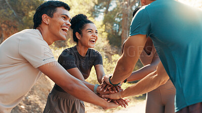 Buy stock photo Exercise, huddle and running with friends outdoor together for bonding, motivation or support. Excited, fitness and stack of hands with group of people in circle for practice, training or workout