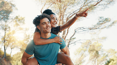 Buy stock photo Pointing, travel and piggyback with couple in nature for sightseeing, romance and support. Bonding, holiday destination and explore with man and woman outdoor for adventure, connection and love