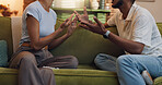 Argument, disagreement or hands of man and woman in home for conflict or fight resolution. Anger, drama or frustration with unhappy people on sofa in apartment for blame, discussion or mistake