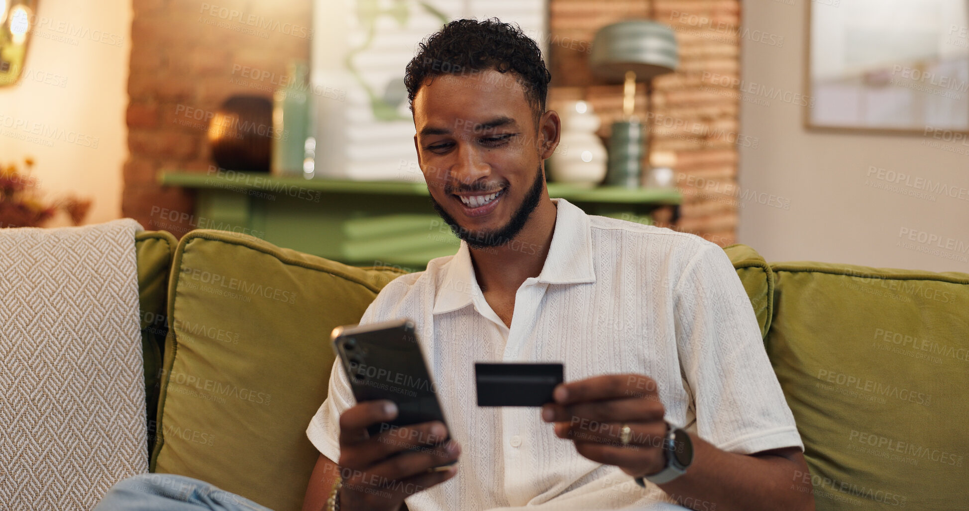 Buy stock photo Home, credit card and man on couch, cellphone and ecommerce with savings, smile or investment. Financial payment, online shopping or person with fintech account, smartphone or digital app for banking