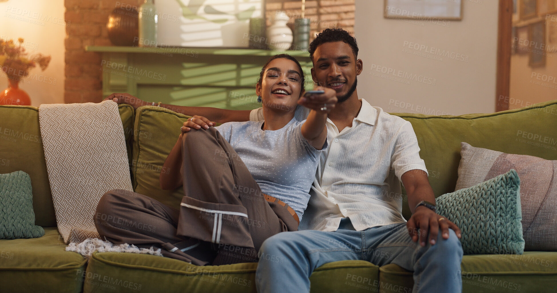 Buy stock photo Happy couple, relax or watching tv with remote on sofa for online entertainment, bonding or movie at home. Man, woman or lovers with smile on couch for show, series or streaming subscription at house