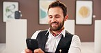 Smile, man and reading with phone at art gallery for research, artwork information and schedule event. Male curator, mobile and social media reviews, online auction and showroom catalog of exhibition