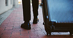 Business person, legs or walking with suitcase in city for corporate travel, destination or commute. Closeup, immigrant or shoes with luggage for job, career opportunity or work trip in an urban town