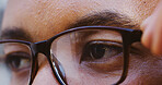 Eyes, thinking and person with glasses closeup for optometry, wellness and vision correction. Planning, zoom and remove spectacles for eyesight health, eyecare and reflection of idea or decision