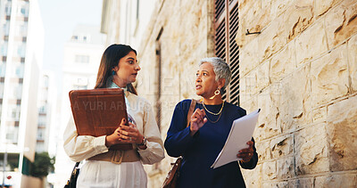 Buy stock photo Lawyer, team and talking with business people in city for case files, trial assessment and attorney brief. Plead agreement, legal partnership and advocate paperwork with women outdoor for discussion