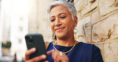 Buy stock photo Smile, scroll and phone with business woman in city for communication, real estate listing and connection. Networking, client feedback and property viewing schedule with mature person outdoor 