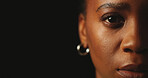 Fear, portrait and space with black woman in studio for mental health, ptsd and stress on dark background. Half face, serious and trauma with person on mockup for abuse, crisis and depression closeup