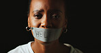 Woman, tape and mouth for help in studio for silence, voice and censorship by black background. African person, portrait and text on lips with depression, sad and mental health with space in Nigeria
